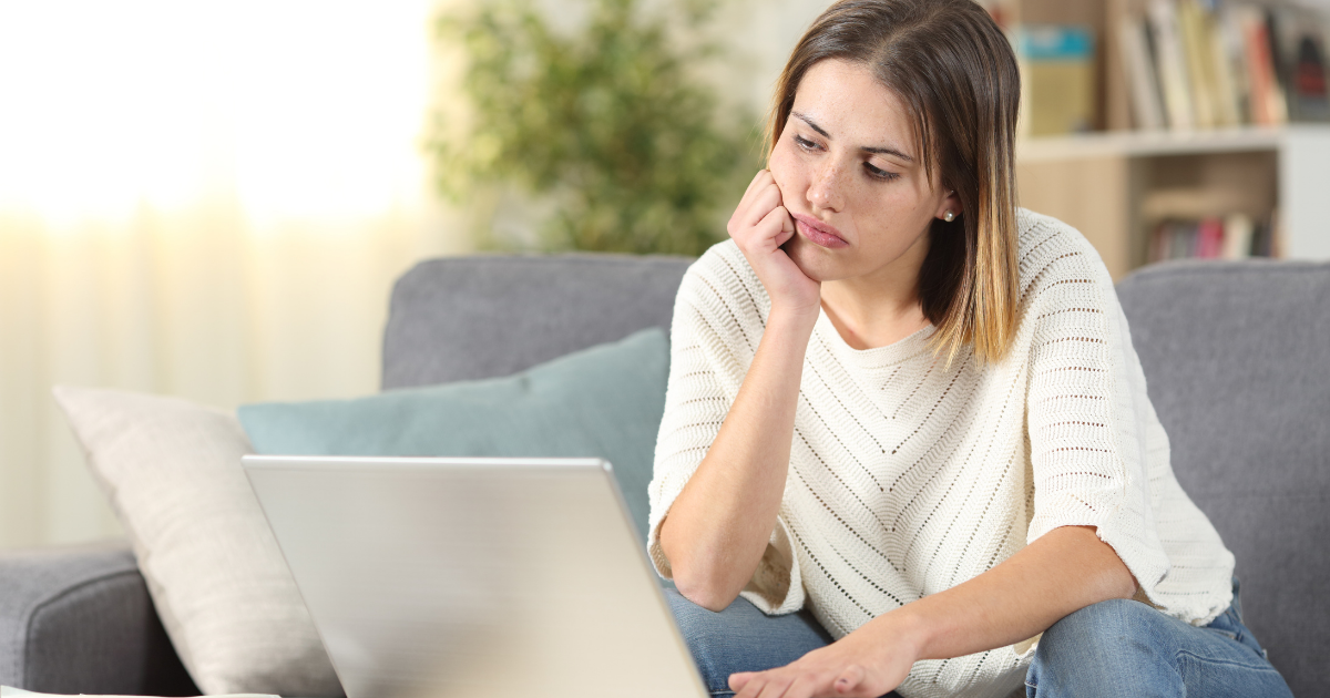 Person reviewing payslips and tax documents after claiming the tax-free threshold from two jobs